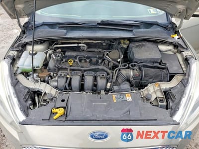 Zdjęcie 11 z 12 samochodu: 2016 FORD FOCUS TITANIUM VIN:1FADP3N2XGL302922 - miniatura