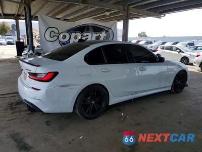 Trzecie zdjęcie samochodu z tyłu: 2022 BMW M340I VIN:3MW5U7J00N8C54948 - miniatura
