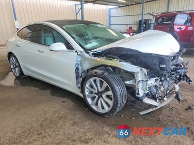Czwarte zdjęcie samochodu z boku: 2019 TESLA MODEL 3 VIN:5YJ3E1EB1KF392487 - miniatura