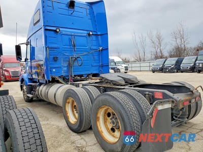 Trzecie zdjęcie samochodu z tyłu: 2014 VOLVO VN VNM VIN:4V4M99DG4EN150100 - miniatura