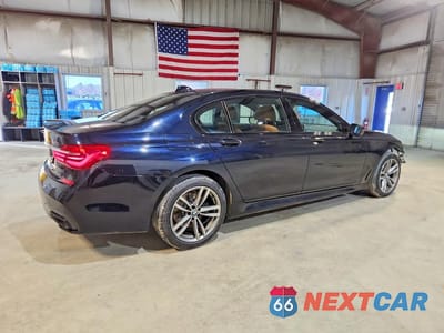 Trzecie zdjęcie samochodu z tyłu: 2018 BMW 750 XI VIN:WBA7F2C58JG424130 - miniatura