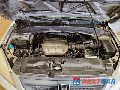 Zdjęcie 12 z 13 samochodu: 2003 HONDA PILOT EXL VIN:2HKYF185X3H509317 - miniatura