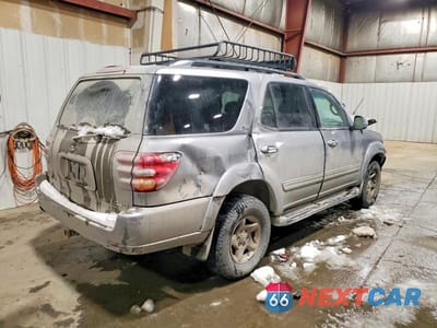 Trzecie zdjęcie samochodu z tyłu: 2001 TOYOTA SEQUOIA SR5 VIN:5TDBT44A71S016589 - miniatura