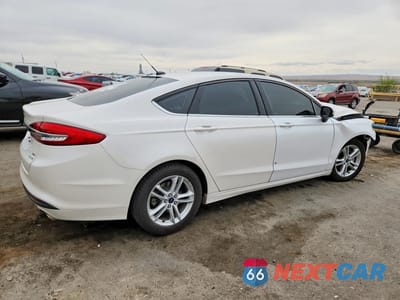 Trzecie zdjęcie samochodu z tyłu: 2018 FORD FUSION SE VIN:3FA6P0HD7JR131026 - miniatura