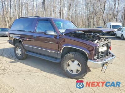 Czwarte zdjęcie samochodu z boku: 1997 CHEVROLET TAHOE K1500 VIN:3GNEK18R8VG190200 - miniatura