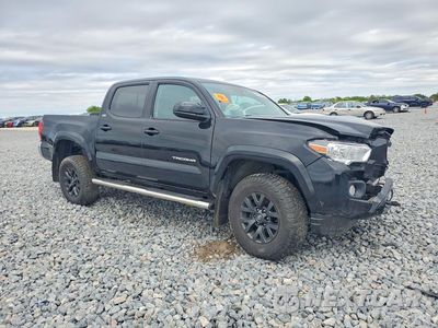 Czwarte zdjęcie samochodu z boku: 2023 TOYOTA TACOMA SR5 V6 VIN:3TMCZ5AN7PM548983 - miniatura