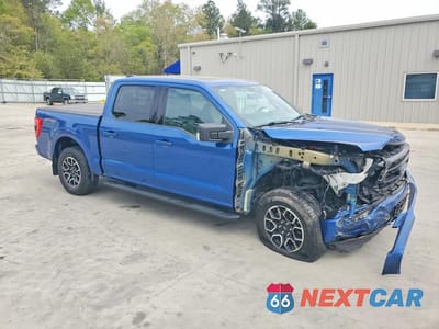 Czwarte zdjęcie samochodu z boku: 2023 FORD F150 SUPERCREW VIN:1FTEW1EP2PKE84154 - miniatura