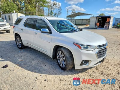 Czwarte zdjęcie samochodu z boku: 2019 CHEVROLET TRAVERSE PREMIER VIN:1GNERKKW2KJ275950 - miniatura