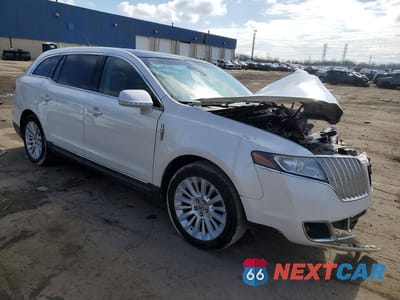 Czwarte zdjęcie samochodu z boku: 2012 LINCOLN MKT VIN:2LMHJ5AT3CBL52062 - miniatura