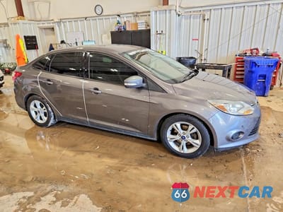 Czwarte zdjęcie samochodu z boku: 2014 FORD FOCUS SE VIN:1FADP3F26EL360599 - miniatura