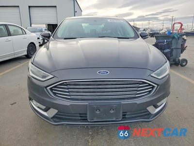 Piąte zdjęcie samochodu w środku: 2017 FORD FUSION TITANIUM HEV VIN:3FA6P0RUXHR295850 - miniatura