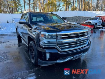 Czwarte zdjęcie samochodu z boku: 2016 CHEVROLET SILVERADO K1500 HIGH COUNTRY VIN:3GCUKTEJ5GG201056 - miniatura