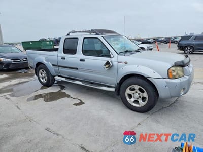 Czwarte zdjęcie samochodu z boku: 2002 NISSAN FRONTIER SC-V6 VIN:1N6MD29X42C309860 - miniatura