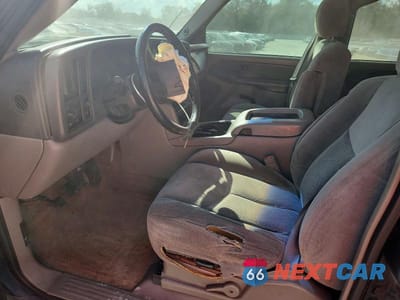 Zdjęcie 7 z 13 samochodu: 2003 CHEVROLET TAHOE C1500 VIN:1GNEC13V13R233855 - miniatura