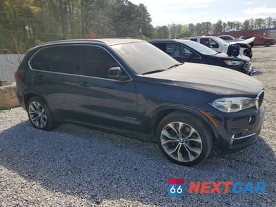 Czwarte zdjęcie samochodu z boku: 2017 BMW X5 XDR40E VIN:5UXKT0C52H0S80473 - miniatura