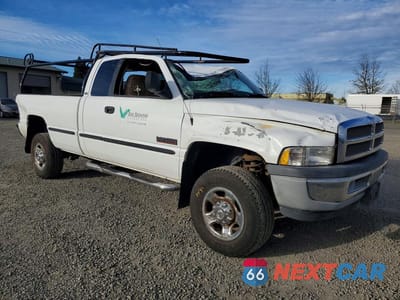 Czwarte zdjęcie samochodu z boku: 1999 DODGE RAM 2500 VIN:1B7KF2364XJ637738 - miniatura