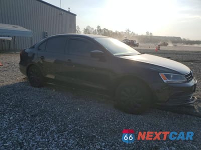 Czwarte zdjęcie samochodu z boku: 2015 VOLKSWAGEN JETTA BASE VIN:3VW2K7AJ9FM253839 - miniatura