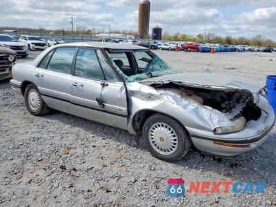 Czwarte zdjęcie samochodu z boku: 1999 BUICK LESABRE CUSTOM VIN:1G4HP52K0XH473723 - miniatura