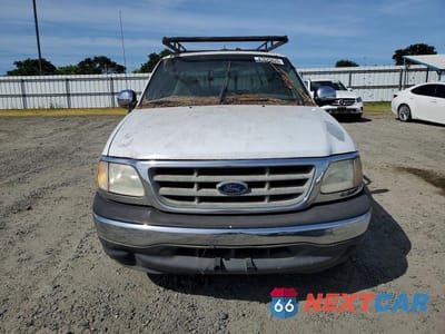 Piąte zdjęcie samochodu w środku: 2000 FORD F150 VIN:1FTRX17L2YKA20341 - miniatura