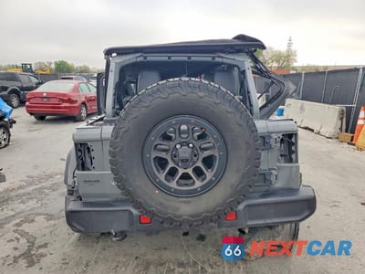 Zdjęcie 6 z 13 samochodu: 2023 JEEP WRANGLER SPORT VIN:1C4HJXDG2PW666526 - miniatura
