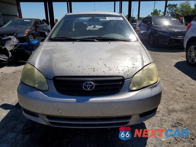 Piąte zdjęcie samochodu w środku: 2003 TOYOTA COROLLA CE VIN:1NXBR32E33Z080072 - miniatura