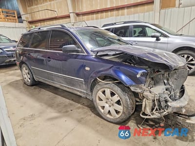 Czwarte zdjęcie samochodu z boku: 2001 VOLKSWAGEN PASSAT GLX 4MOTION VIN:WVWYH63B21E253949 - miniatura