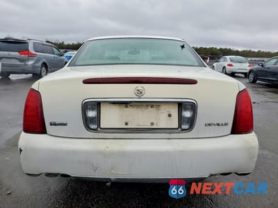 Zdjęcie 6 z 12 samochodu: 2004 CADILLAC DEVILLE VIN:1G6KD54Y94U159305 - miniatura