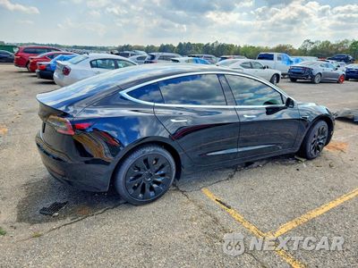 Trzecie zdjęcie samochodu z tyłu: 2019 TESLA MODEL 3 VIN:5YJ3E1EAXKF307198 - miniatura