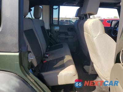 Zdjęcie 11 z 13 samochodu: 2009 JEEP WRANGLER UNLIMITED X VIN:1J4GA39149L719055 - miniatura
