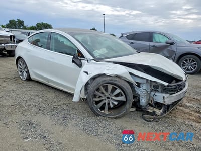 Czwarte zdjęcie samochodu z boku: 2020 TESLA MODEL 3 VIN:5YJ3E1EA3LF745952 - miniatura