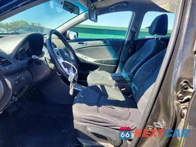 Zdjęcie 7 z 14 samochodu: 2013 HYUNDAI ACCENT SE VIN:KMHCU5AE4DU130754 - miniatura