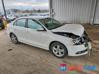 Czwarte zdjęcie samochodu z boku: 2012 VOLKSWAGEN JETTA TDI VIN:3VW3L7AJ8CM090517 - miniatura