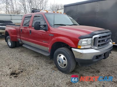 Czwarte zdjęcie samochodu z boku: 2002 FORD F350 SUPER DUTY VIN:1FTWW33F92EB22839 - miniatura