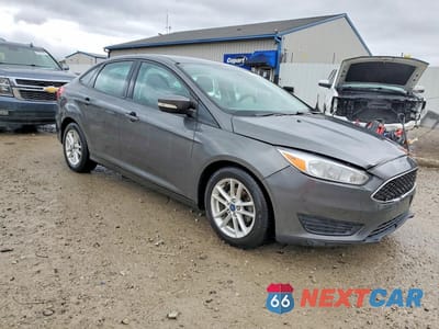 Czwarte zdjęcie samochodu z boku: 2017 FORD FOCUS SE VIN:1FADP3F2XHL208460 - miniatura