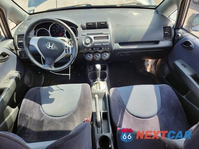 Zdjęcie 8 z 14 samochodu: 2007 HONDA FIT S VIN:JHMGD38697S038398 - miniatura