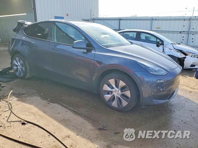 Czwarte zdjęcie samochodu z boku: 2023 TESLA MODEL Y VIN:7SAYGAEE9PF594272 - miniatura
