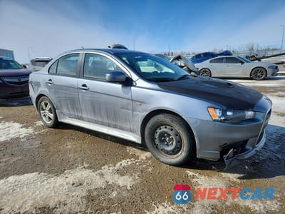 Czwarte zdjęcie samochodu z boku: 2015 MITSUBISHI LANCER ES VIN:JA32U2FU1FU601226 - miniatura