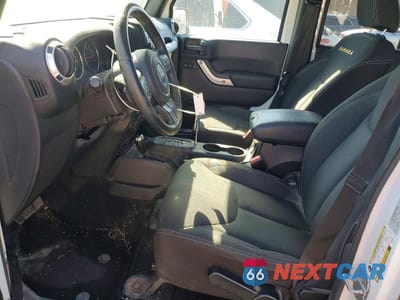 Zdjęcie 7 z 13 samochodu: 2015 JEEP WRANGLER UNLIMITED SAHARA VIN:1C4HJWEG7FL689843 - miniatura
