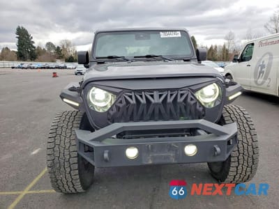Piąte zdjęcie samochodu w środku: 2020 JEEP WRANGLER UNLIMITED SPORT VIN:1C4HJXDN1LW184803 - miniatura