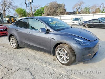 Czwarte zdjęcie samochodu z boku: 2023 TESLA MODEL Y VIN:7SAYGDEE9PF979056 - miniatura