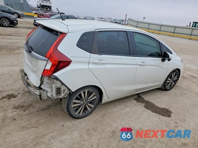 Trzecie zdjęcie samochodu z tyłu: 2015 HONDA FIT EX VIN:3HGGK5H85FM746838 - miniatura