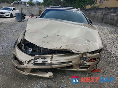 Piąte zdjęcie samochodu w środku: 1997 NISSAN MAXIMA GXE VIN:JN1CA21D2VT845044 - miniatura