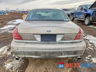 Zdjęcie 6 z 12 samochodu: 2004 FORD CROWN VICTORIA UNKNOWN VIN:2FAFP74W44X181727 - miniatura