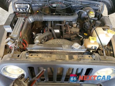 Zdjęcie 12 z 13 samochodu: 2000 JEEP WRANGLER / TJ SAHARA VIN:1J4FA59SXYP782863 - miniatura