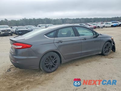 Trzecie zdjęcie samochodu z tyłu: 2020 FORD FUSION SE VIN:3FA6P0HDXLR201377 - miniatura