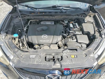 Zdjęcie 12 z 13 samochodu: 2014 MAZDA CX-5 TOURING VIN:JM3KE2CY4E0335591 - miniatura