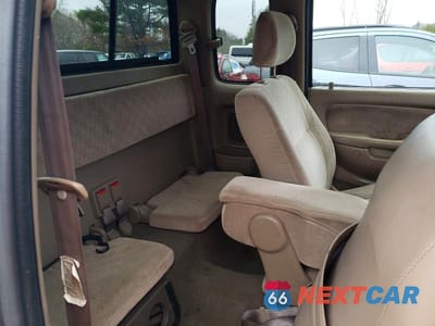 Zdjęcie 10 z 11 samochodu: 2003 TOYOTA TACOMA BASE VIN:5TEWM72N13Z227847 - miniatura