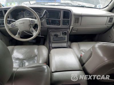 Zdjęcie 8 z 14 samochodu: 2004 GMC YUKON DENALI VIN:1GKEK63U54J135982 - miniatura