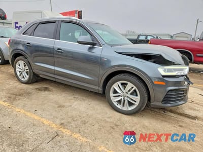 Czwarte zdjęcie samochodu z boku: 2018 AUDI Q3 PREMIUM PLUS VIN:WA1JCCFS8JR011633 - miniatura