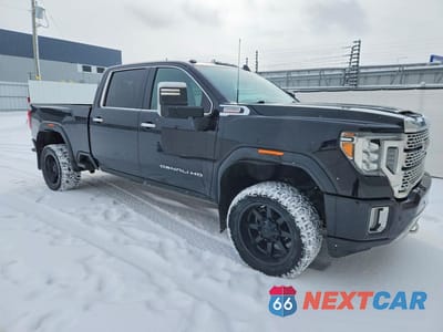 Czwarte zdjęcie samochodu z boku: 2020 GMC SIERRA K3500 DENALI VIN:1GT49WEY0LF304715 - miniatura